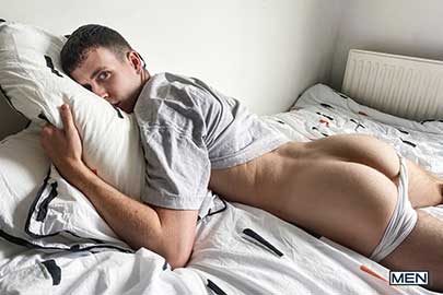Cute British twink Cain lies back in bed in a t-shirt and a pair of white briefs that cling to every inch of his hard cock. He runs his hands over his body and strokes his dick through the thin material....