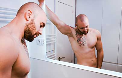 Hot AF bearded Spanish bro Axel Garcia has mesmerizing green eyes and a muscular 6'2" body. Enjoy as he showers and rubs soap all over his body before jerking off his uncut cock.