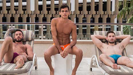 Lounging about in their speedos, real life brothers Preston Cole and Judas Cole lay back and bask in the sun. Along comes newcomer Ashton Summers.