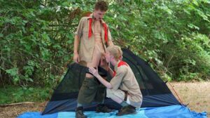 Scout Master Colton McKeon welcomes new scout boy Drew to camp. Given that Drew seems to be missing home, Scout Master Colton comforts him with a hug before getting intimate with him right outside their tent!
