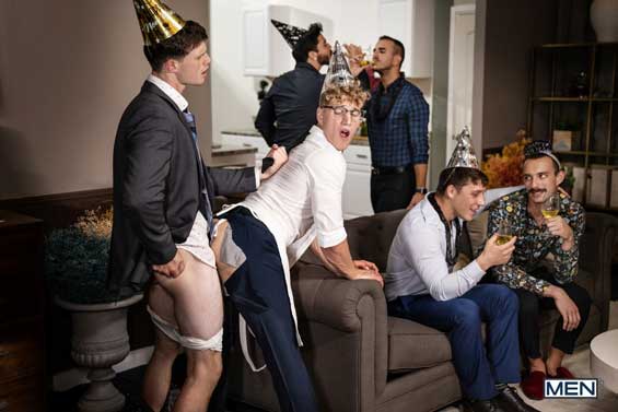 After Paul Canon sucks his boyfriend, Finn Harding's cock at a New Year's Eve party, he doesn't want to spill a drop on either of their immaculate suits, so he spits the load into a glass of bubbly...