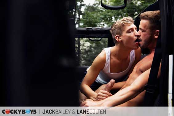 One lazy summer afternoon Jack Bailey and Lane Colten playfully cruise each other in the park, but once Lane gives Jack a sneak peek of his cock, they get make haste to get it on.